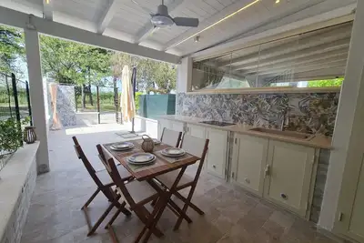 Image de Cozy beach house 150 mt from the beach kitchen and shower also outside