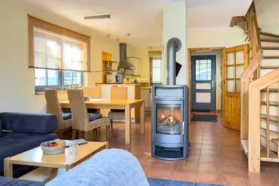 Image de Haus Sonnenschein - House Sonnenschein - with terrace, garden and fireplace