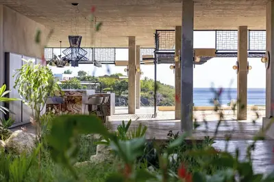 Image de Artistic full off grid oceanfront Villa with tropical garden and luxury kitchen.
