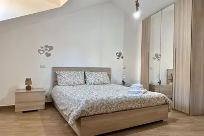 Image de Appartement 'Alba E Tramonto' avec vue sur les montagnes, Wi-Fi et climatisation