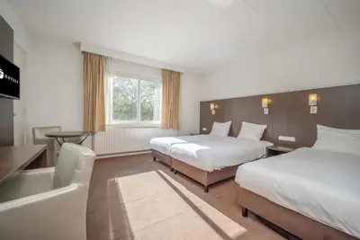 Image de Unwind in Nature's Embrace: 4 Family-Friendly Rooms Near Beekse Bergen Zoo