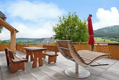 Image de Maison de vacances 'Chalet Schonzeit' avec vue sur la montagne, terrasse privée et Wi-Fi