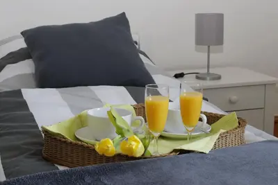 Image de Appartement 'Sonnenhaus' avec vue sur le lac, jardin partagé et Wi-Fi