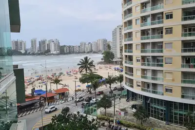 Image de Vista Praia Pitangueiras  2 Dorm 1 passo da praia Guarujá