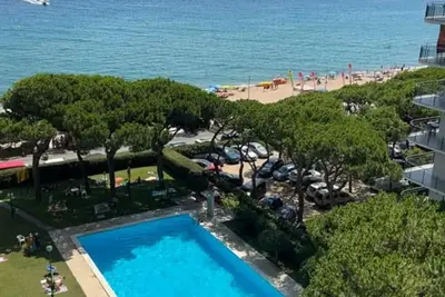 Bright Apartment with Two Balconies and a Seaside Pool