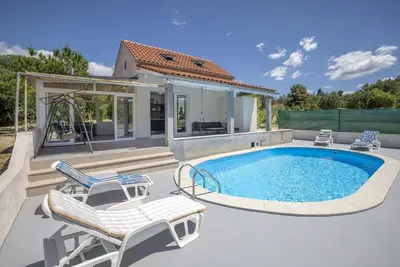 Image de Villa Baras garden - house with pool
