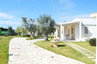 Maison de vacances 'Punta Rosa A S Foca' avec jardin privé et climatisation