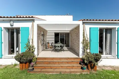 Image de Maison Familiale Ă Grand-Village-Plage avec 3 Chambres, Wi-Fi, et Machine Ă Laver - 6 Personnes