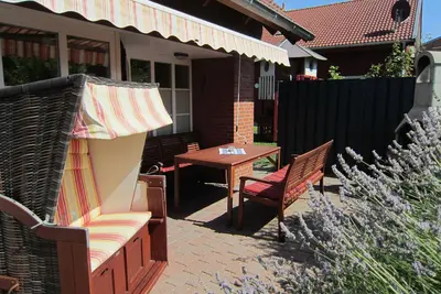 Image de Maison de vacances 'Kleiner Leuchtturm-Backbord' avec terrasse privée, jardin privé et Wi-Fi