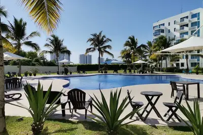 Image de Relax and Work by the Beach – 2br Condo with Pools, WiFi, A/C in Playa Blanca