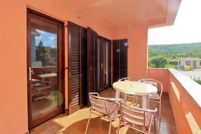 Image de Appartement de vacances avec climatisation, balcon et Internet Wi-Fi