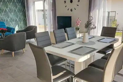 Image de Merveilleuse maison de vacances pour 6 personnes avec Wifi, Tv, terrasse, animaux admis et parking
