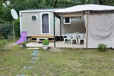 Image de Mobil-home sur un terrain privé avec Jardin et Parking à 10min de la Plage