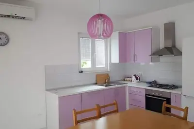 Image de Appartement de vacances Podgora pour 1 - 4 personnes avec 2 chambres Ă coucher - Maison de vacances