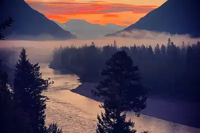 Image de \"In Vans by the River\" offers grand views of Flathead River, while close to town