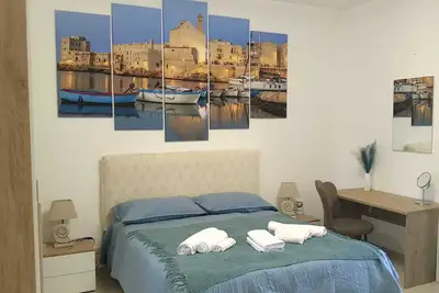Image de Vello Blu Apartment 5 minutes from the sea, the station and the historic center.