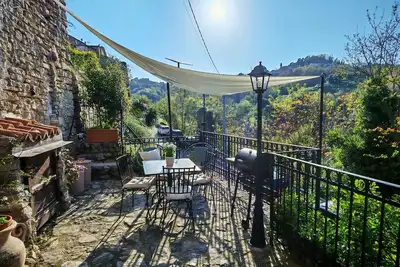 Image de The cozy little house with terrace in the medieval walls