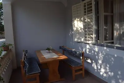 Image de Appartement de deux chambres avec le balcon Barbat, Rab (A-24277-a)