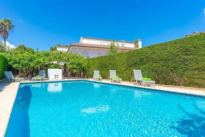 Image de Retraite au bord de la piscine de Can Picafort