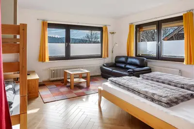 Image de Appartement 'Haus Wintersonne - FeWo Luchs' avec terrasse privée, jardin partagé et Wi-Fi