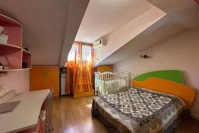 Image de A comfortable room in a large and convenient apartment-hotel with six rooms.