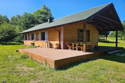 Image de Maison au bord du lac Wierzchowo avec bateaux