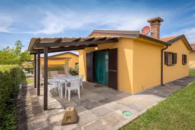 Image de Maison de vacances 'Milla - Villetta Quaglia' avec piscine partagée, terrasse privée et Wi-Fi