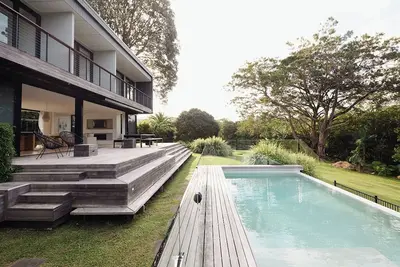 Image de Luxurious modern family home w/ pool & spacious gardens, 7 minutes to the beach!