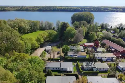 Image de New vacation home with boat on the lake - your modern dog-friendly retreat