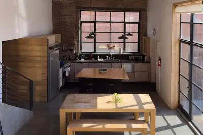 Modern Loft with Wood Stove, River Views, Walkable