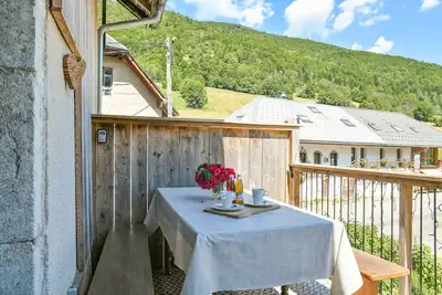 Image de Maison de vacances 'Ciméléon Haut' avec vue sur les montagnes, jardin privé et Wi-Fi