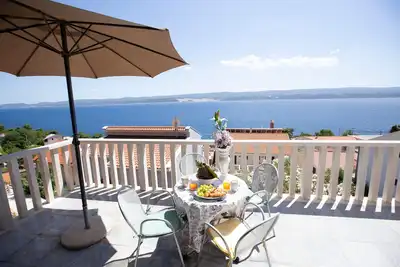 Image de Appartement d'une chambre avec la terrasse et la vue sur le mer Lokva Rogoznica, Omis (A-19633-a)