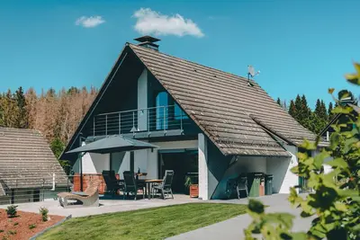 Image de Maison de vacances 'Mit Terrasse' avec vue sur le lac, terrasse privée et Wi-Fi