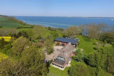 Image de Favorite place by the sea - farmhouse on MĂĽhlendamm with sea view garden, oven and