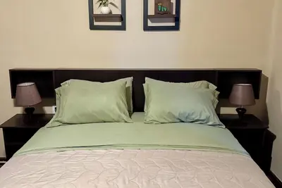 Image de Double room with queen size bed and sofa bed, terrace and plants