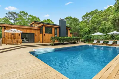 Image de Chic Hampton Bays escape with private pool, expansive sundeck, and seamless. . .