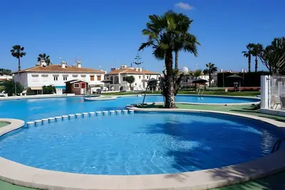 Image de Appartement \"Bungalow 58\" avec piscine partagée, Wi-Fi et climatisation