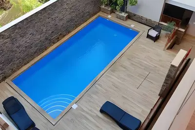 Image de Appartement 'Mit Pool 50m Strand' avec piscine partagée, Wi-Fi et climatisation