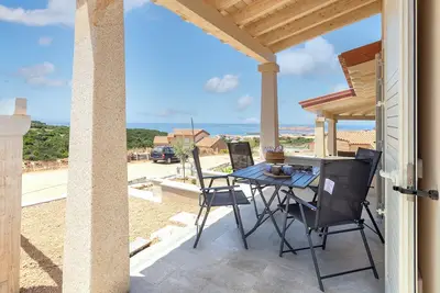 Image de Appartement 'Borgo Del Mare 3' avec vue sur mer, terrasse privée et climatisation