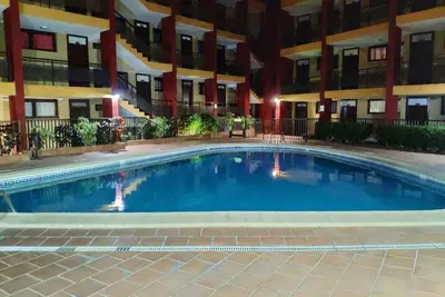 Image de Appartement de vacances 'Coqueto Apartamento' avec piscine partagée, terrasse privée et Wi-Fi