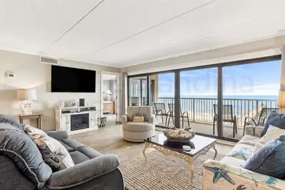 Image de Experience beachfront luxury at 667 Amelia by the Sea, perfect for your next family getaway.