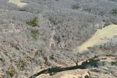 Image de 136-acres/Secluded cabin/River access/Kayak/Hiking trails/Utv/Indoor pickleball