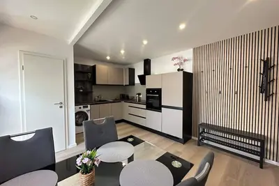 Image de Modern city apartment for 4 people in Mg