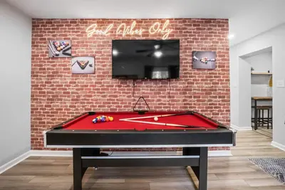 Image de 4 Bed, 3 Bath, Hot tub, Fun Game Room, Fire Pit, 12 min Nrg