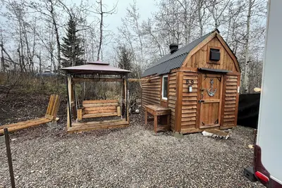 Image de Payne Lake Wilderness Huts - Camper A18\n A cozy camper near a quiet lake!