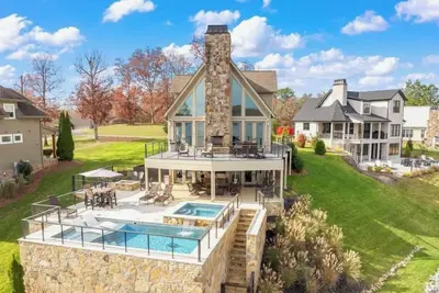 Image de Luxurious Lakefront Home with a Private Saltwater Pool, Spa, & Deep-Water Dock