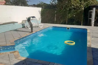 Image de Family beach house. Excellent swimming pool and barbecue area for your leisure.