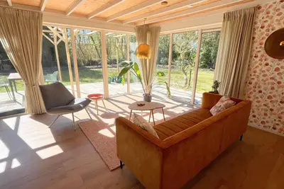 Image de De Bosuil, a cozy and luxurious detached bungalow of 60 square meters for 2 people, located in a peaceful spot within the park.