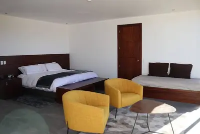 Image de \"Cotopaxi Sanctuary Lodge\" Habitación Triple