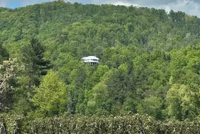 Image de Mountain View’s, dual water fall Koi pond and private theater.
